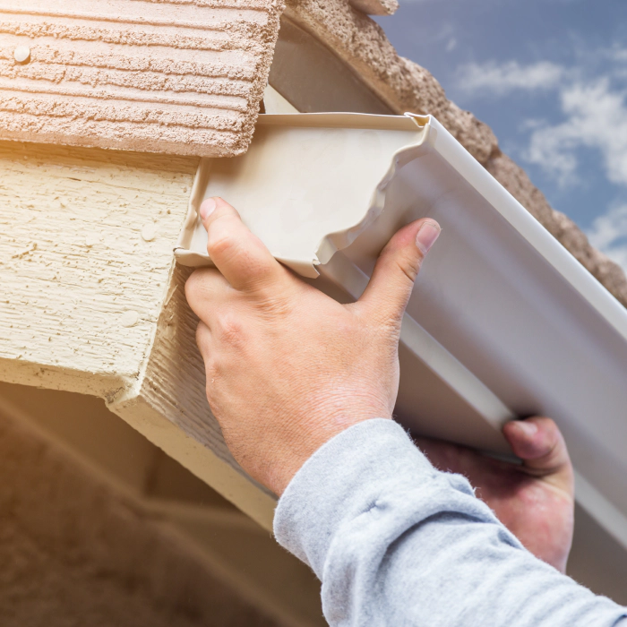 contractor repairing a seamless gutter san jose ca