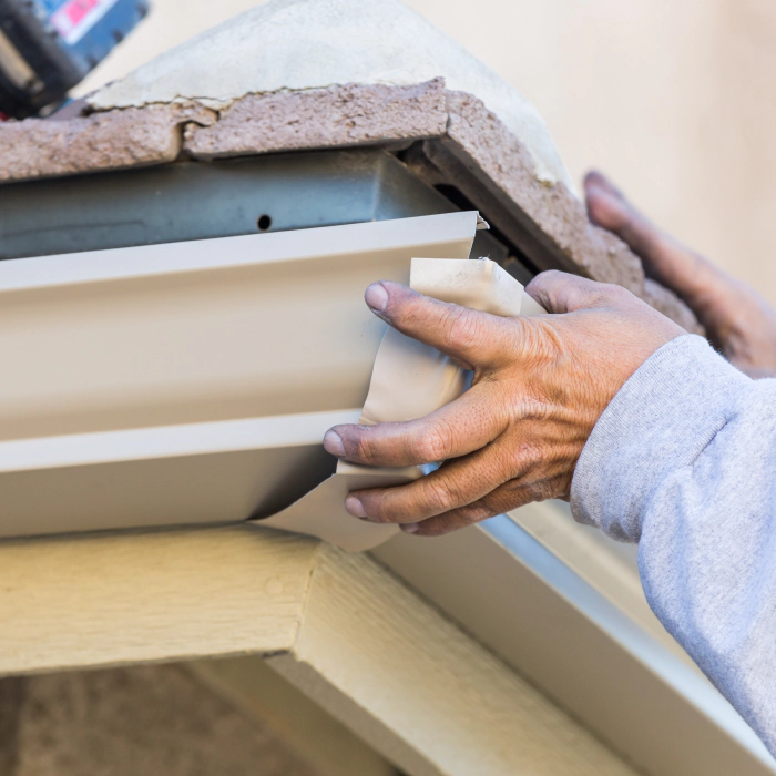 contractor repairing a seamless gutter santa clara ca